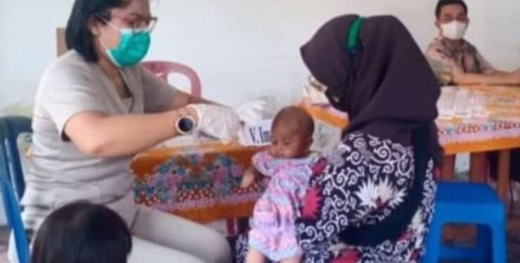 Pelaksanaan imunisasi bagi anak di kota Palangka Raya