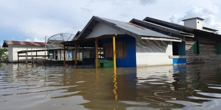 FOTO : Humas/MATA KALTENG - Kondisi salah satu desa di Kotim yang terendam banjir.