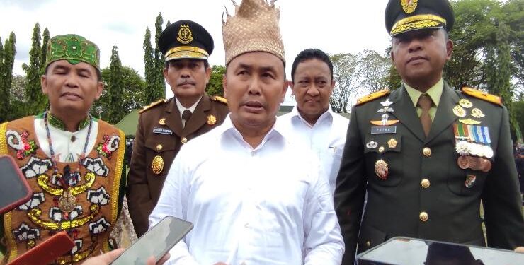 FOTO : OLIVIA/MATAKALTENG - Gubernur Sugianto Sabran saat menghadiri rangkaian Peringatan HUT TNI Ke-77.