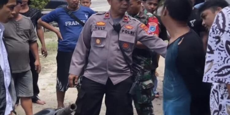 FOTO: AGUS/MATA KALTENG - Pelaku pencurian kotak amal masjid Al Kamal saat diamankan oleh pihak kepolisian, Rabu, 3 Mei 2023.