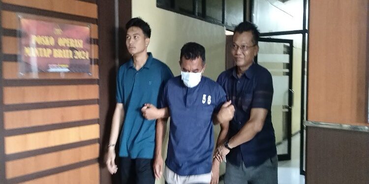 FOTO: AGUS/MATAKALTENG - HR tersangka kasus CPO ilegal.