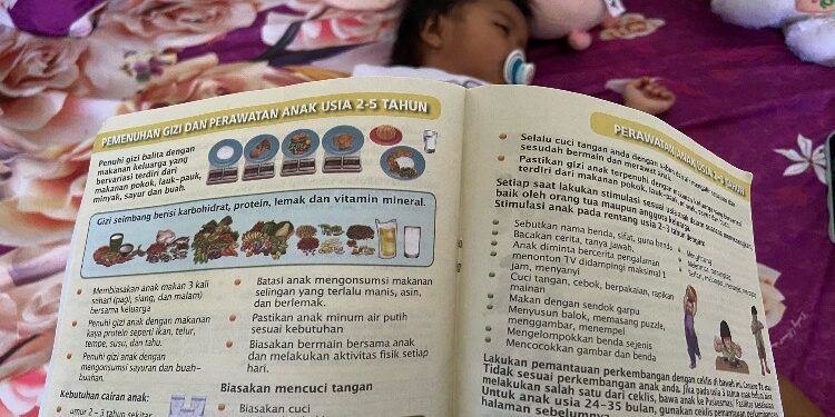 FOTO: DIAN/MATA KALTENG - Panduan makanan bergizi untuk anak di dalam bulku KIA Pink.