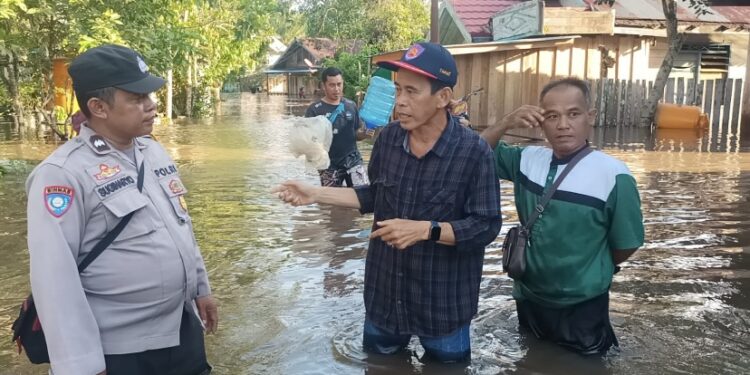 FOTO: KECAMATAN/MATA KALTENG - Kondisi banjir di Desa Pantai Harapan, Kecamatan Cempaga Hulu, Kotim.