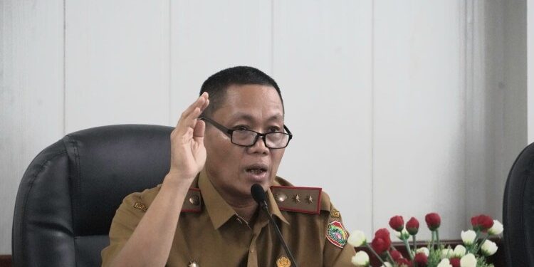 FOTO: MATAKALTENG - Staf Ahli Gubernur Kalteng Bidang Ekonomi, Keuangan dan Pembangunan Yuas Elko saat menyampaikan sambutannya.