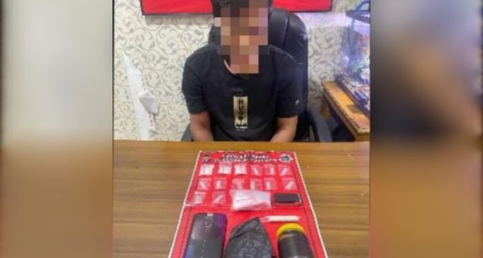 FOTO: IST/MATAKALTENG - AM saat diamankan beserta barang bukti di Mapolres Kotim.