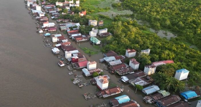 Foto:IST/MATA KALTENG - Banjir yang merendam Desa Hanjalipan belum lama ini.