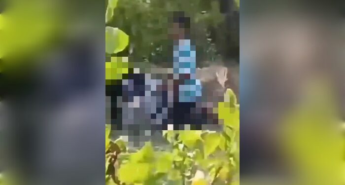 FOTO: IST/MATAKALTENG - Tangkap layar vidio viral pasangan sejoli sedang melakukan hubungan badan ditengah semak belukar.