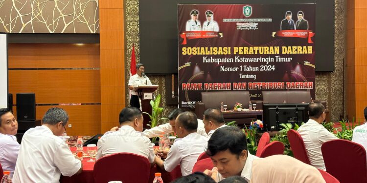 FOTO : DOK DEVIANA/MATAKALTENG - Kepala Bappenda Kotim Ramadhansyah saat membuka sosialisasi Peraturan Undang-undang Nomor 1 Tahun 2022.