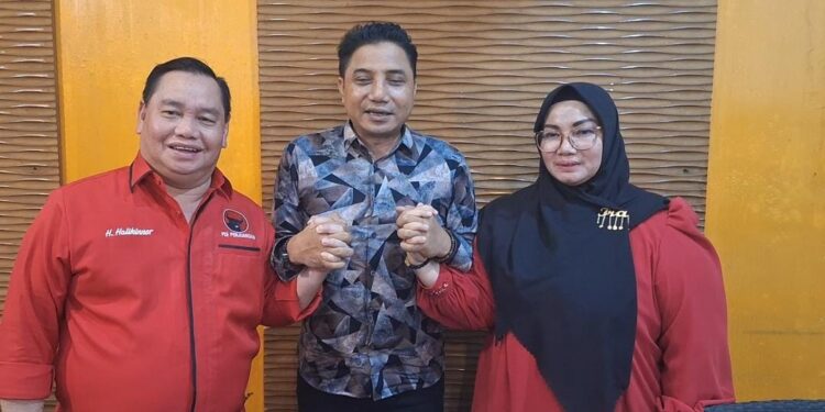 FOTO: MATAKALTENG - Bakal calon Bupati Kotim, Halikinnor (kiri) dan bakal calon Wakil Bupati Kotim, Irawati (pojok kanan).