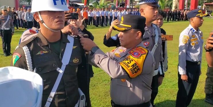 FOTO: IST/MATAKALTENG- Apel Operasi Lilin Telabang 2024 yang dilakukan di Lapangan Pemda Kotim. Jumat, 20 Desember 2024.