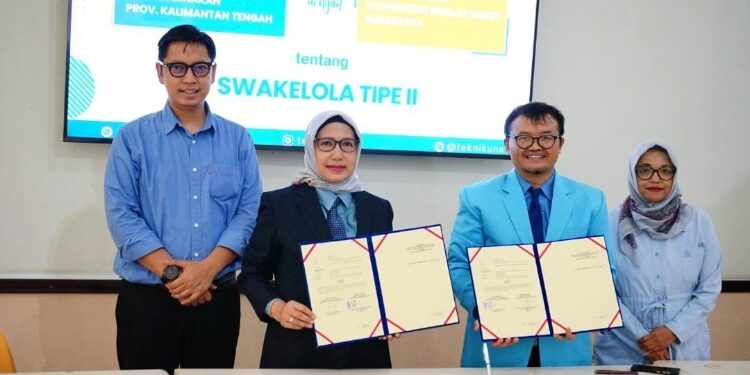 FOTO: IST/MATAKALTENG - Kadis TPHP Kalteng, Sunarti melaksanakan penandatanganan PKS Pengawasan Konstruksi Cetak Sawah dengan Dekan Fak. Teknik UNS, Wahyudi Sutopo di Surakarta.