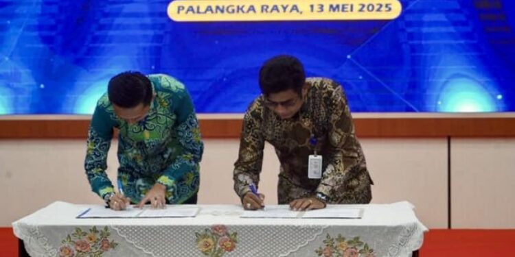 FOTO: IST/MATAKALTENG - Penandatanganan Berita Acara Sertijab Kepala Diskominfosantik Kalteng.