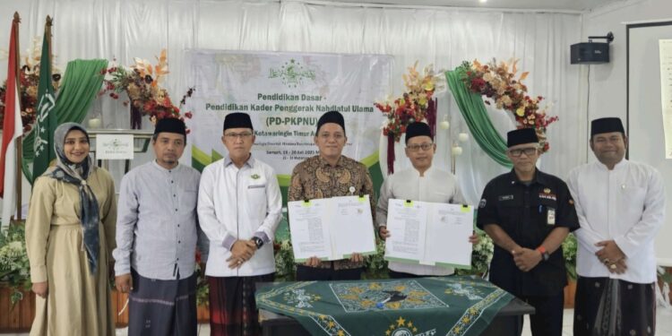 Foto: IST/MATA KALTENG - Penandatanganan MoU NU dan BPJS Ketenagakerjaan.