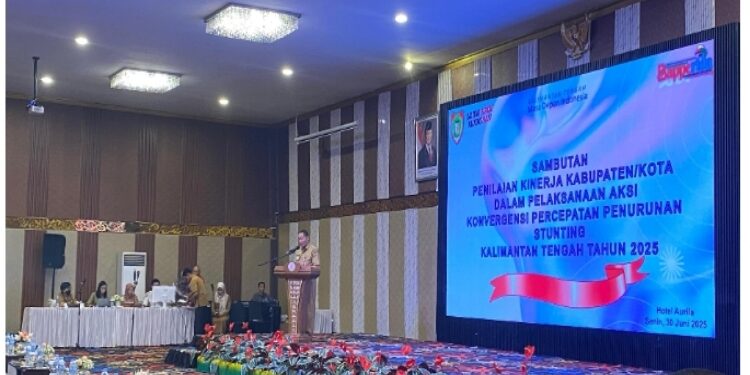 FOTO: IST/MATAKALTENG - Staf Ahli Gubernur Bidang Ekonomi, Keuangan, dan Pembangunan, Yuas Elko, saat penyampaian sambutan.