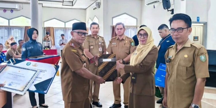 Foto:IST/MATA KALTENG - acara penghormatan purna tugas yang digelar di Balai Diklat Aparatur BKPSDM Kotim, Selasa 30 September 2025.