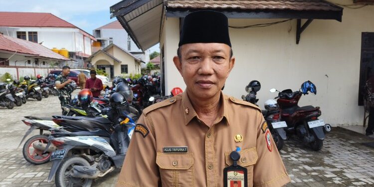 Foto: Kepala Disdukcapil Kotim, Agus Tripurna Tangkasiang.